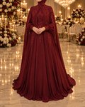 Amani burgundy modest evening gown with high beaded collar, beaded cuffs, floor-length cape and matching hijab